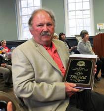 West Milford Environmental Commission Chair Steve Sangle, with the commission since its earliest days, continues to lead West Milford in dealing with the latest environmental challenges facing the township. He is pictured in 2014 when the Township of West Milford honored him as “Lifetime Volunteer” and presented him with a plaque.