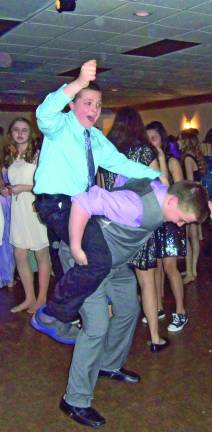 The boys didn't let their attire keep them from some raucous dancing.