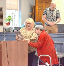 Mayor Michele Dale honors JoAnn Blom, right, as the 2024 recipient of the Mary B. Haase Lifetime Volunteer Award at the Township Council meeting Wednesday, April 23. (Photos by Fred Ashplant)