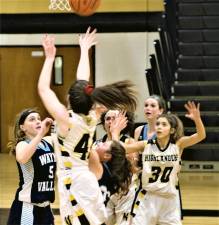 A Lady Highlander takes a shot during its Jan. 28 home loss to Wayne Valley.