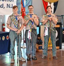 ES1 From left, Benjamin Lighty, Benjamin Gray and Lucien Barca are new Eagle Scouts in Troop 114. They were honored for reaching Scouting’s highest rank June 22. (Photo provided)