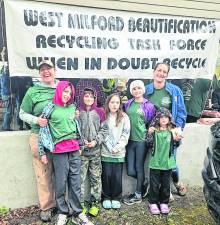 Beautification Day volunteer moms Erin Colfax (far left) and Karen Muto, owner of DeMarco’s Pizzeria &amp; Restaurant, joined the cleanup and picnic with their children.