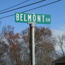 Photo by Ann Genader Belmont Drive - a private road that connects with Union Valley Road and is near the West Milford Town Center - was considered for a road assessment program and township ownership some years ago. Not enough residents voted to participate in a proposed assessment program but a small number of the residents paid to have their area of the road paved. That work is not up to township standards and the road remains in the private road category.