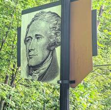 This “Welcome to Passaic County” sign features Alexander Hamilton.