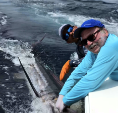 West Milford resident Steve Sangle is seen with a 450-pound marlin he hooked while fishing in the Pacific off the coast of Costa Rica. Photo provided.