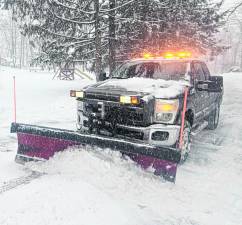 Plow trucks moved heavy volumes of snow from roadways throughout snowstorm duration and after.