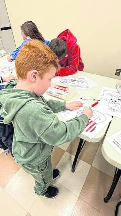 Jackson B., 5; of West Milford draws.