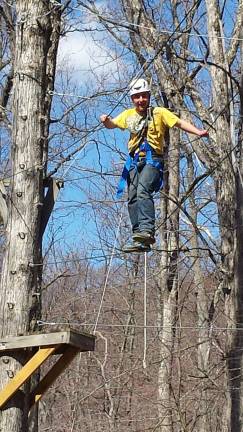 Michael Dougherty tackles one of the team-building exercises.