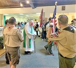 Scouts celebrate Scout Sunday at Our Lady Queen of Peace