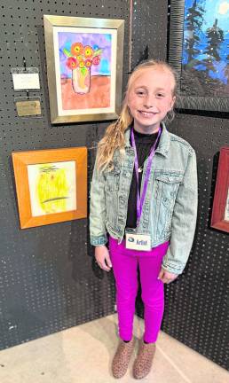 Vivian Clave finished third in the 12-and-0younger age group for Flowers for Mommy.