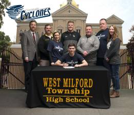 Photos provided West Milford High School senior Anthony Cecere recently signs to continue his wrestling career at Centenary College.
