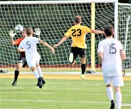 The Highlanders boys’ soccer team takes a shot on goal during Oct. 2 home match against DePaul.