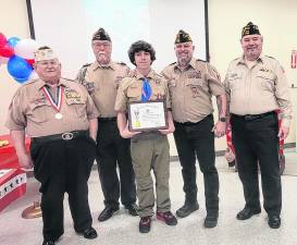 Dominic Weidemann, Boy Scouts Troop 159’s newest Eagle Scout, poses with members of West Milford Veterans of Foreign Wars Post 7198. (Photo provided)