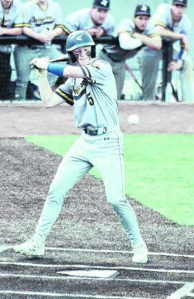 Jefferson batter Eric Hokenberg leans back to avoid being hit by the ball.