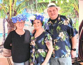 Barbara Holstein of Montague and Kerry Thompson of Franklin are shown with Jason Doyle, ex-chief of the Franklin Fire Dept.
