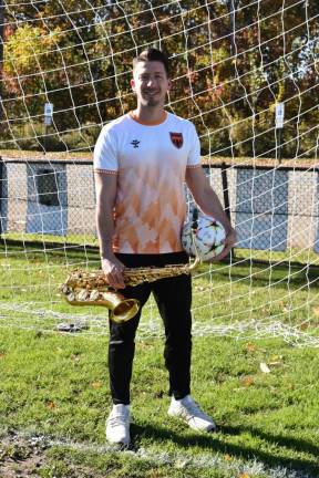Matt Gramata, coach, manager and a player on the Milford FC soccer club, also is an accomplished musician and director of the West Milford High School Band. (Photo by Rich Adamonis)