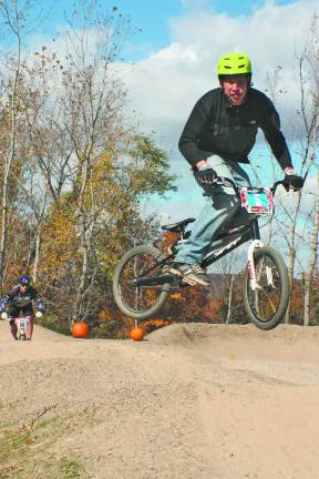 Young kids and older kids and adults are fans of pump track riding.
