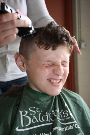 Photos by Ginny Raue The face says it all. Ten-year old Ryan Vetter braved the shave for the St. Baldrick's Foundation.