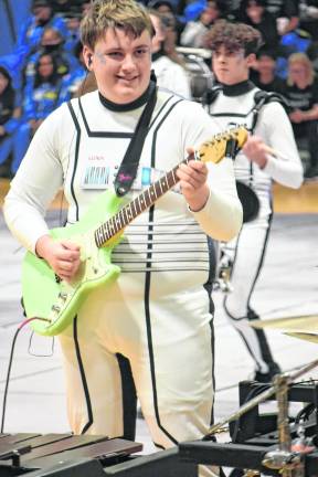 A student plays guitar during the 2026 USBands Indoor Percussion New Jersey scholastic circuit kick-off event at West Milford High School, earning top score of 76.250 with its Stowaway’ theme on Saturday, Feb. 21.