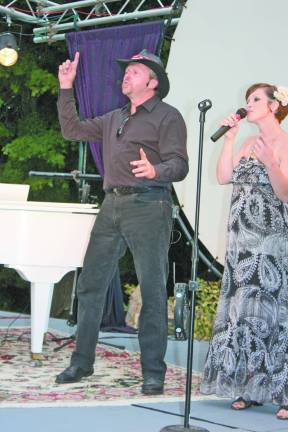 Morgan Paul and Jeni Bilheimer sang with their hearts - and their souls. The Concert for the Caring. Photo by Ginny Raue