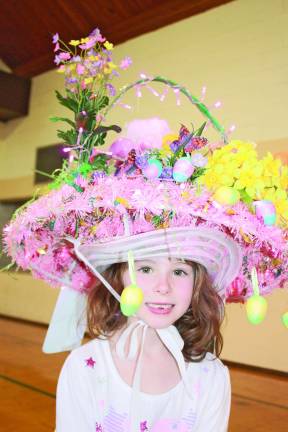 Photo by Ginny Raue Six-year-old Sarah Fillipowicz first place in last year's bonnet contest.