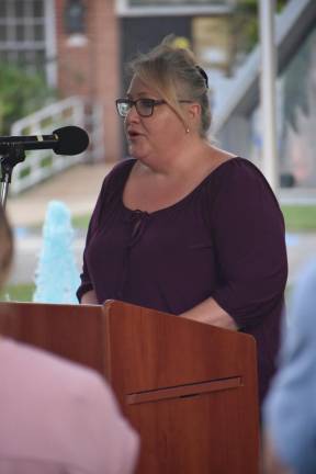 Mayor Michele Dale reads the names of those who died in the Sept. 11, 2001, terrorist attacks.