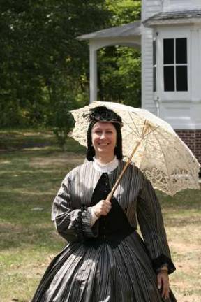 Monica Digrindakis of Newfoundland, in period dress, enjoyed a walk in the sun.
