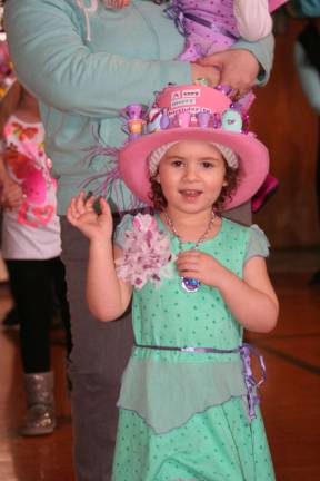 Photos by Don Webb A tea party was the theme for the spring celebration, held by the township's Community Services and Recreation Department, and this little girl certainly kept with the theme.