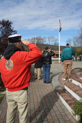 During an acapella rendition of the Star Spangled Banner, veterans saluted the flag.
