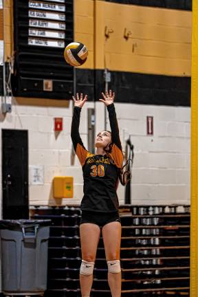 West Milford High School junior Ava Biancamano sets the ball to her teammate.
