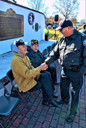 West Milford police Lt. Joseph Nevin thanks Korean War veteran Ed Ollearo for his service to our country.