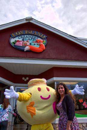 Mayor Bettina Bieri and Mr. Fro, the mascot of the Fox Island Creamery and Cafe, pose for photos after the official grand opening of the new ice cream place on Greenwood Lake Turnpike in Hewitt.