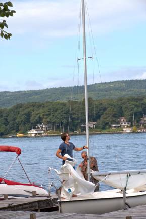 Father and son Jack and Jason Roe get ready to set sail on Greenwood Lake while the weather is still nice.
