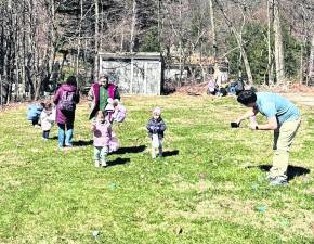 Children hunt for Easter eggs at Highlands Community Church on March 28.,