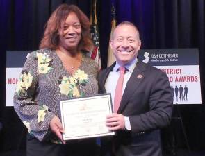 U.S. Rep. Josh Gottheimer presents Lisa McKoy of Westwood in Bergen County a “Hometown Heroes” Award. McKoy helped lead a group of Westwood Borough volunteers assisting Hackensack Pascack Valley Hospitals on Westwood’s Vaccination Days. She worked long hours and went door-to-door in her neighborhood to reach out to seniors without social media, helping get hundreds of seniors, residents, teachers and workers vaccinated. Provided photos.