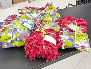 West Milford. Womans’ Club donates handmade blankets