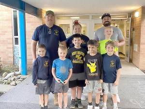 Maple Road Cub Scouts worked hard to clean up around Maple Road School for Earth Day.