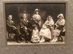 Ethel Tintle Kochka and her husband, George, on their wedding day at St. Joseph Church, Echo Lake, in the late 1920s or early 1930s. Her sisters serving as the bride’s attendants are Irene, standing; Cecelia, seated; and Marie, by a basket of flowers. (Photo provided)