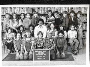 Students in Patrick Porcaro’s sixth-grade class at Marshall Hill School in 1980, in front row from left, are Warren Stephens, Billy Francis, Tyler Harrington, John Geiger and Brett Touw. In middle row, from left, are Beth Ackroyd, Nichole Alfieri, Angie Hartym, Jeanne Tregidgo, Jean Akers and Kristine Cardaci. In back row, from left, are Glen Walsh, Chris Turner, Rebecca Reinle, Debbie Cutts, Roseanne Labita, Mark Pueschel, Anthony McArthur, Mark Corbett, John Puliafico and Brian Gallagher. (Photo provided)