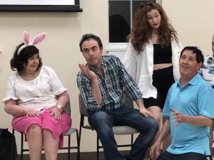 The coast of “The Jackie Mason Musical” rehearses at the West Milford Township Library.