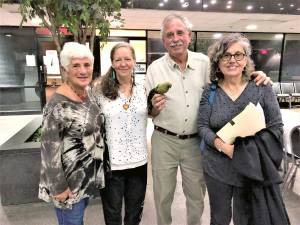Robin Rose Bennett, second from left, joins three other members of Sustainable West Milford at the Passaic County Board of Chosen Freeholders meeting Tuesday night to discuss the use of roadside pesticides.