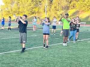 West Milford Highlander Marching Band practices a performance.