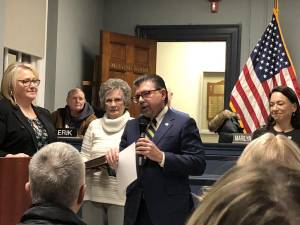 State Sen. Anthony Bucco, R-25, speaks before administering the oath of office to Mayor Michele Dale, left, at the Township Council’s annual reorganization meeting Wednesday, Jan. 3. At right is Assemblywoman Aura Dunn, R-25. (Photo by Kathy Shwiff)