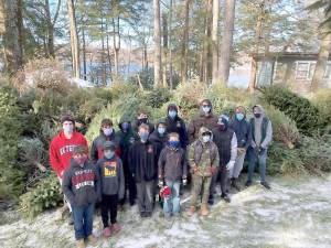 Scout Troop 151 ran a highly successful fund raiser on the third and tenth of January this year. For a small donation - many gave more - the Scouts picked up Christmas trees from residents’ homes. The trees were then chipped to be used as bedding at a local farm. Provided photo.