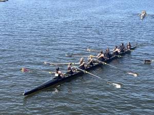 Members of the Warwick Valley High School crew team row on the water. Photo by Greg Sirico.