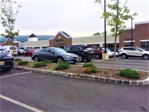 Complaints that parking spaces at the West Milford Village business center lot are too tight are under study.