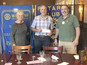 Rotary is a global network of approximately 1.2 million people who unite and take action to create lasting change around the world. West Milford’s Rotary Club is about 60 years old and their members follow the Rotary motto “Service Above Self.” West Milford Rotarian of the month Frida Salvigsen and Rotary President Glenn Gross are pictured donating a check to Friends of the Wallisch Homestead representative Mark Lynch. Photo provided by the West Milford Rotary Club.