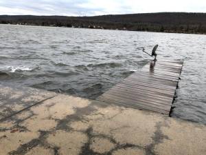 The wind Wednesday afternoon, Jan. 10 creates a white cap on Greenwood Lake. The lake is very full after the recent snow and rain storms. Usually, the lake is about four feet below the cantilevered dock.