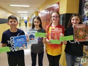 Photo provided Macopin poster contest winners The winners of Macopin Middle School's recent poster contest are, from left to right: Max Moore, Sophia Burghoffer, Mandi Dellagicoma and Ava Jagiello. Students designed appealing posters to advertise Macopin's &quot;Winter Wonderland&quot; activity night. They won free admission to the event.