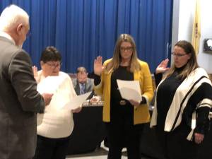 Taking the oath of office Tuesday, Jan. 2 are West Milford Board of Education members, from left, Lynda Van Dyk, Miranda Jurgensen and Stephanie Marquard. (Photo by Kathy Shwiff)